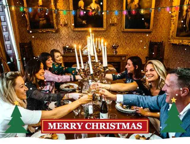 Dinner party photo with string lights and snow from the Christmas effect, shaped for a template window