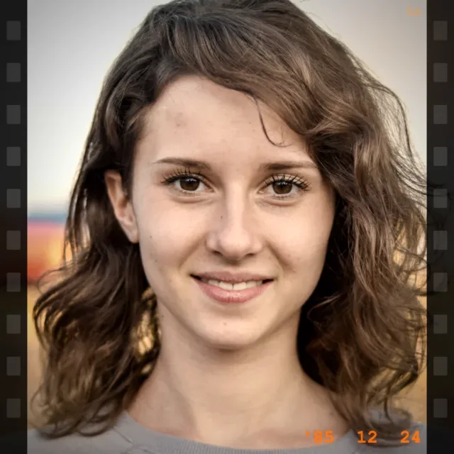 The same portrait with the Vintage Film effect: sepia warmth, grain, vignette, film edges and an orange date imprint